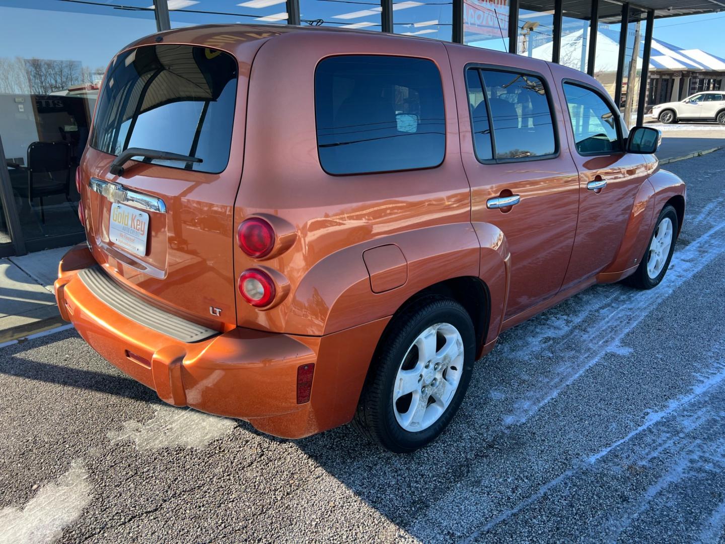 2006 Sunburst Orange II Metallic Chevrolet HHR LT (3GNDA23PX6S) with an 2.4L L4 DOHC 16V engine, 5-Speed Automatic transmission, located at 1633 W Kimberly, Davenport, IA, 52806, (563) 323-5341, 41.559456, -90.598732 - Photo#3